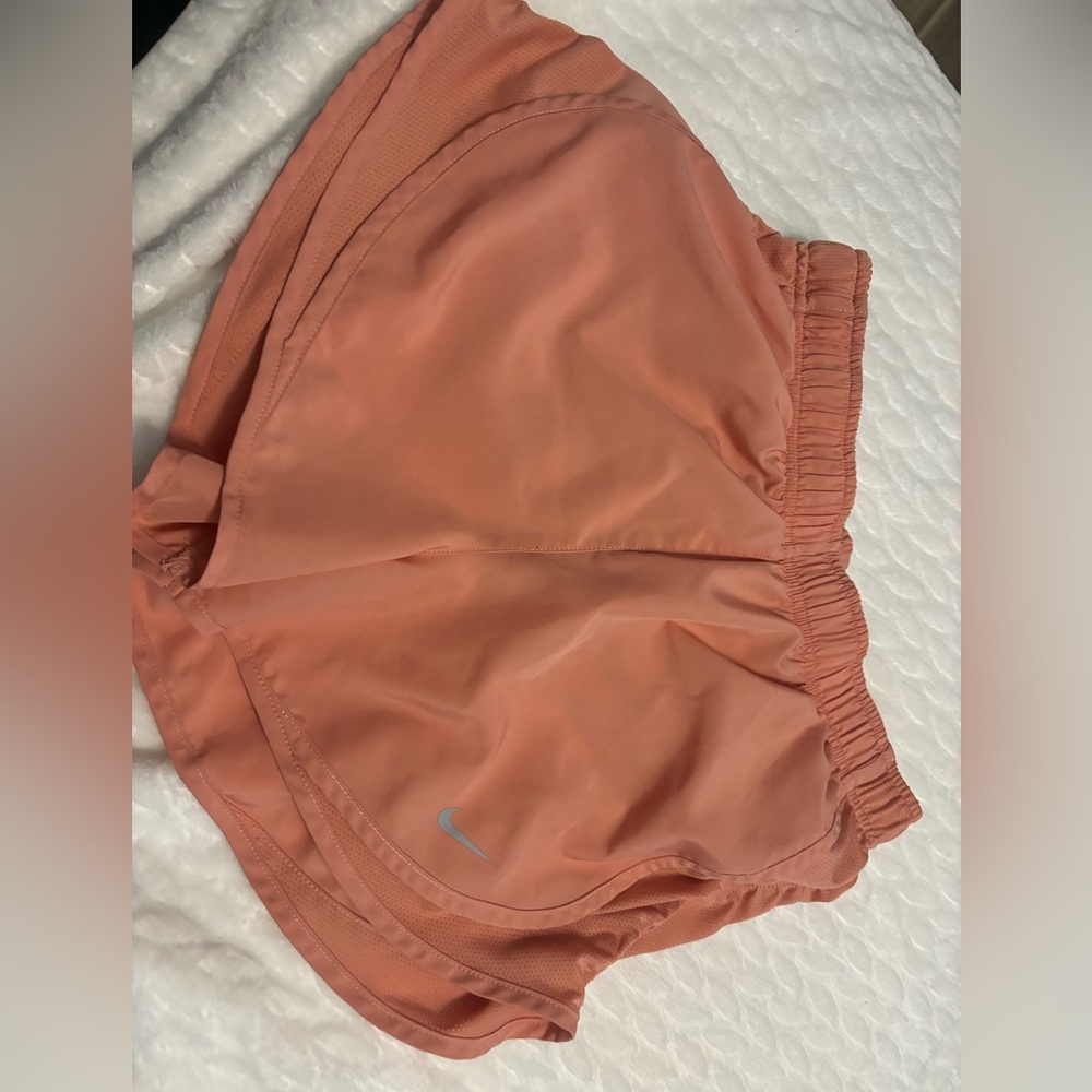 Orange Nike shorts
